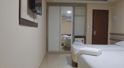 Ένα ή περισσότερα κρεβάτια σε δωμάτιο στο Altiplano Hotel