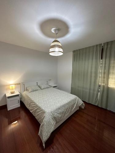 מיטה או מיטות בחדר ב-Casa Ponte Maria