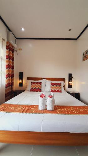Cama o camas de una habitación en El Taraw Bed & Breakfast