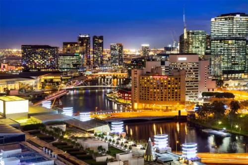 a view of a city skyline at night at Fantastic Views at Luxury Prima Pearl Tower in Melbourne