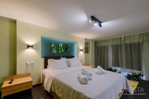 Cama ou camas em um quarto em Jumanji Loft Apartment, Vesta Philoxenia