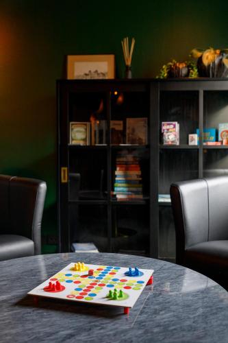 a table with a toy on top of it at Hotell Nyboholm in Ulricehamn
