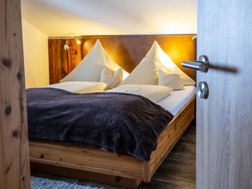 Postel nebo postele na pokoji v ubytování Adlernest