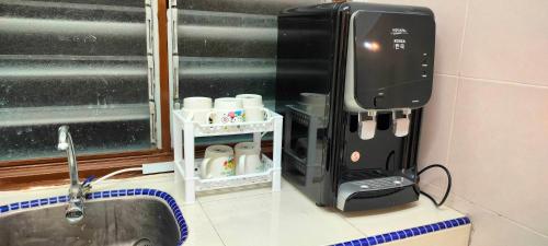 116 Bukit Indah Bentong Homestay- 5min to townにあるコーヒーまたはお茶