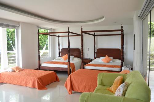 Cama o camas de una habitación en Hotel Mirador Las Palmas