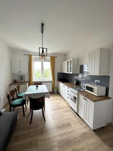 Кухня или мини-кухня в Apartments Old Town
