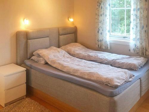 Postel nebo postele na pokoji v ubytování Holiday home SOGNE III