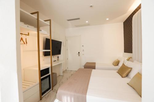 Hotel Cenisioにあるベッド