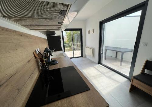 Kuchyň nebo kuchyňský kout v ubytování Maison hyper centre 3 chambres