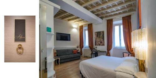 ein Schlafzimmer mit einem Bett und ein Wohnzimmer in der Unterkunft Excellent Trinity Rooms in Rom