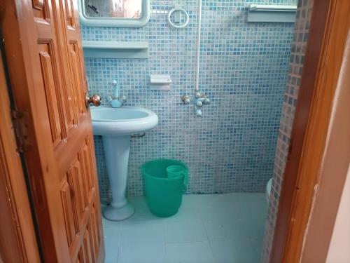 a bathroom with a sink and a toilet and a shower at Galaxy apartments in Lower Topa