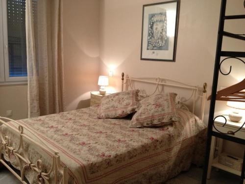 Ліжко або ліжка в номері Les locs de Marie