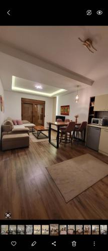 a living room with a couch and a table at JOANDI Apartments Gevgelija in Gevgelija