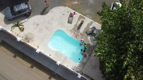 Vista de la piscina de Casa Almendro Herradura o alrededores