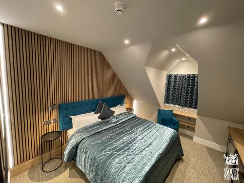 Кровать или кровати в номере The Boutique Hotel