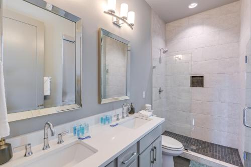 a bathroom with a sink and a toilet and a shower at Nashville Townhome with Rooftop Balcony and Game Room! in Nashville