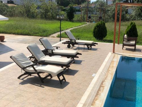 Πισίνα στο ή κοντά στο Parissis Eden Villas Skiathos