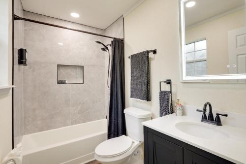 a bathroom with a shower and a toilet and a sink at Pet Friendly Casa Nueve St Augustine Home! in Saint Augustine