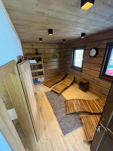 an overhead view of a room with wooden walls at Cabin House Čičmany- Relaxačné zariadenie s ubytovaním in Čičmany