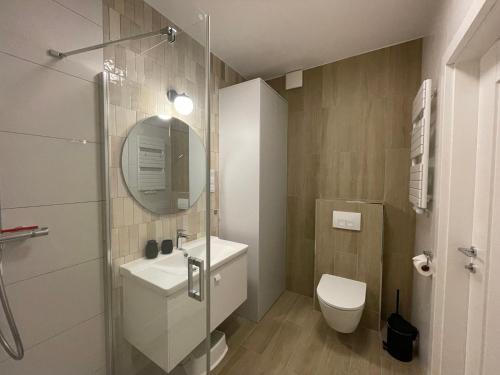 Ένα μπάνιο στο Golden Dunes Apartament Polanki Aqua