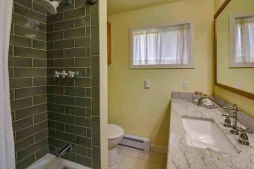 a bathroom with a sink and a toilet and a shower at Waterfront Newport Home with Private Boat Dock! in Newport