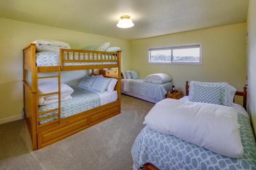 a bedroom with two bunk beds and a bed at Waterfront Newport Home with Private Boat Dock! in Newport