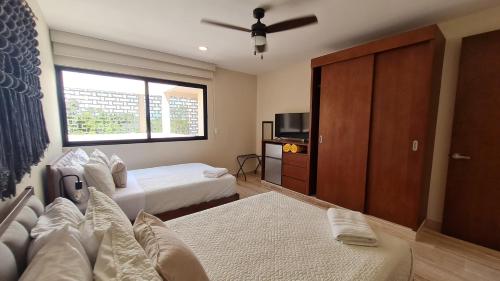 Postel nebo postele na pokoji v ubytování Luxury & Modern Apartments in Tulum Top Amenities By Yeah