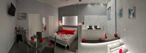 Un pat sau paturi într-o cameră la La Torre SUITE