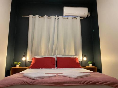 Una cama o camas en una habitación de AP 102-B San Pietro - Térreo