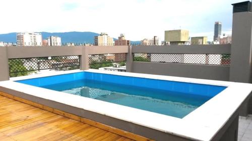 a swimming pool on the roof of a building at TORRES DEL TUCUMAN II in San Miguel de Tucumán