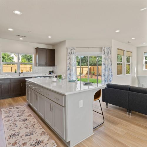 a kitchen with a large island in the middle at Newly Built Murphys Modern Retreat in Murphys