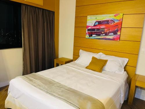 Katil atau katil-katil dalam bilik di Quarto de hotel de luxo Congonhas