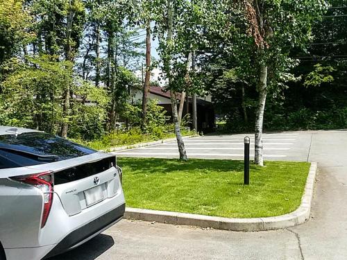 a car parked on the side of a street at Minamitsuru-gun - Hotel / Vacation STAY 45545 in Yamanakako