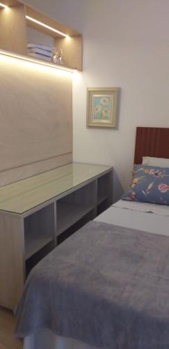 Ένα ή περισσότερα κρεβάτια σε δωμάτιο στο Prime Flat Terê