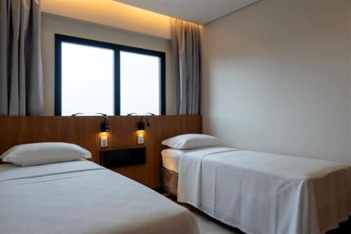 Krevet ili kreveti u jedinici u okviru objekta Salinas Premium Resort