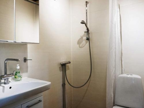 Ванная комната в 4 star holiday home in Rabbalshede-By Traum