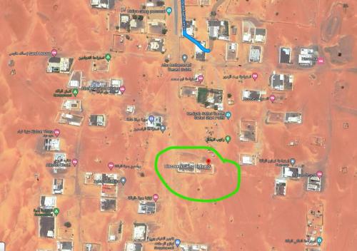 a map of a construction site with a green circle at Discovery Camp Bidiya in Badīyah