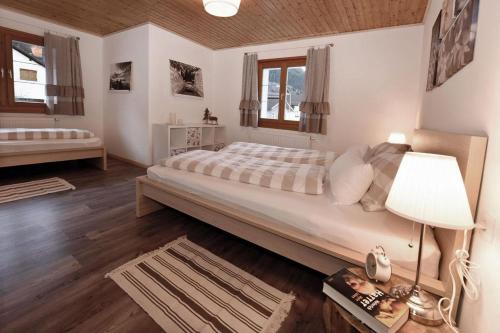 Posteľ alebo postele v izbe v ubytovaní Haus Berta, Montafon