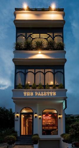 a tall building with lights on top of it at The Palette Dalat in Da Lat