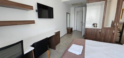 TV a/nebo společenská místnost v ubytování Dorana Residence