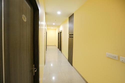 a corridor of a hallway with at FabExpress Trijal Inn in Lucknow