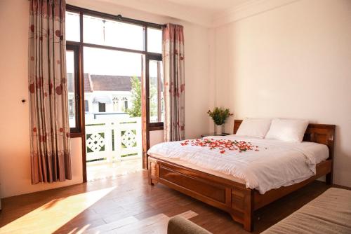 Postel nebo postele na pokoji v ubytování Vang Anh Homestay Hoi An
