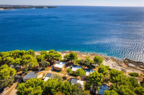 an aerial view of a beach and the water at Arena Stoja Camping Homes in Pula