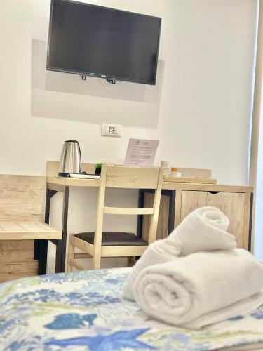Postel nebo postele na pokoji v ubytování B&B Giglio di mare