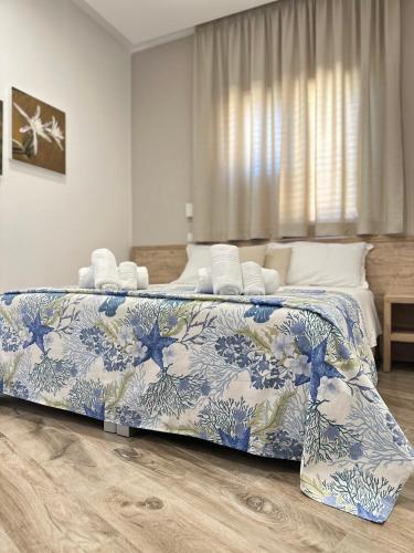 Postel nebo postele na pokoji v ubytování B&B Giglio di mare