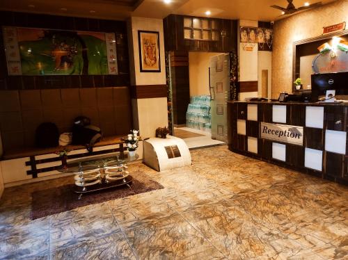 a room with a store with a room with a room at Hotel Bhagwani Palace in Jorhāt