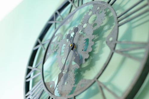 a close up of a clock in a building at BeB Omare Agrigento in Agrigento