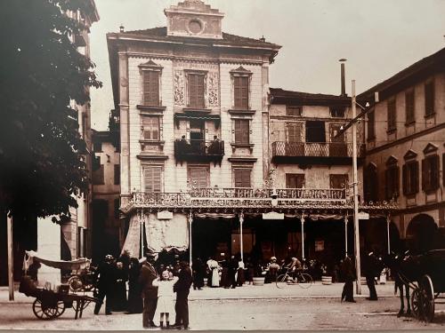 an old black and white photo of a building at Casa Gambusso historical house magnificent Lake View in Verbania