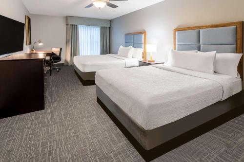Postel nebo postele na pokoji v ubytování Homewood Suites by Hilton Rochester/Greece, NY