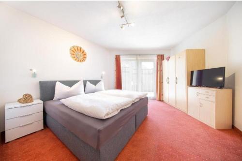 Ένα ή περισσότερα κρεβάτια σε δωμάτιο στο Cozy Apartment by Northsouth Apartments